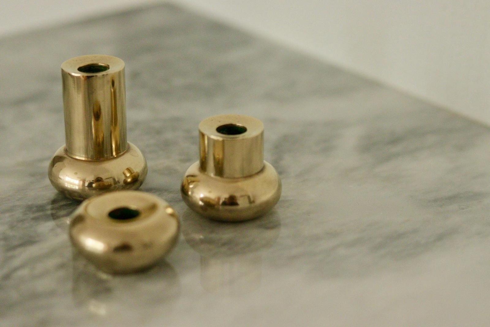 Trio of Mid-Century Swedish Brass Candle Holders