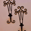Pair of vintage black metal sconces
