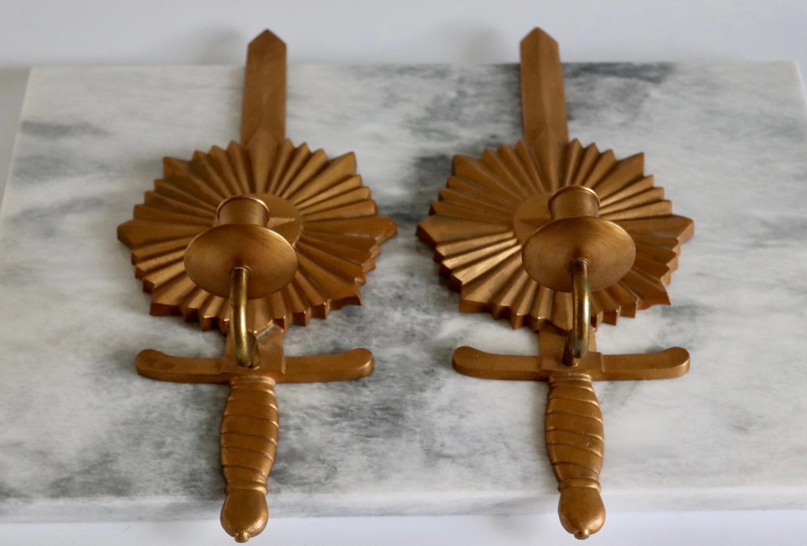 Pair of Mid-century Swedish Bronze Sconces "Knife in North Star"