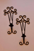 Pair of vintage black metal sconces